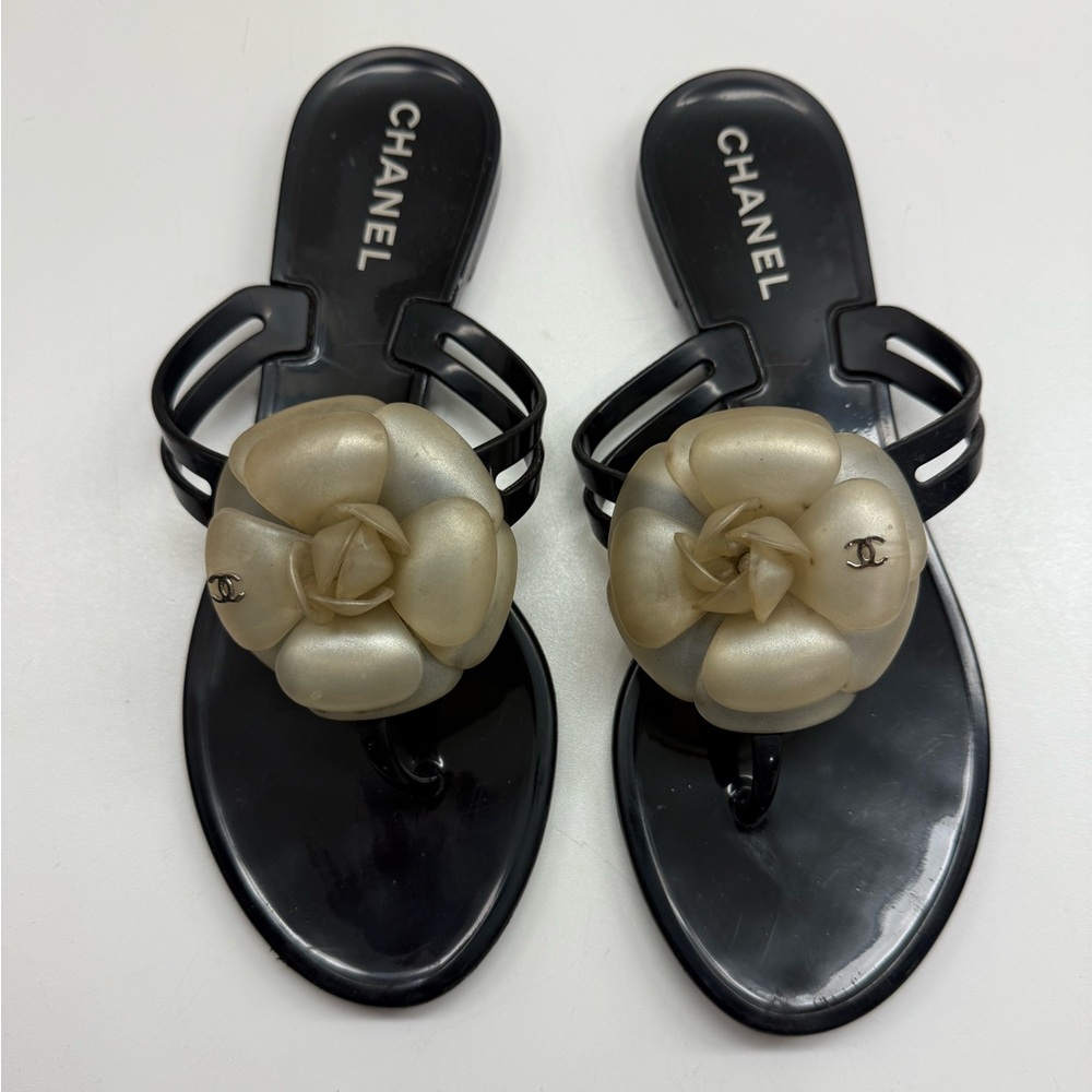 CHANEL Black Sandals with Gold Floral Accent